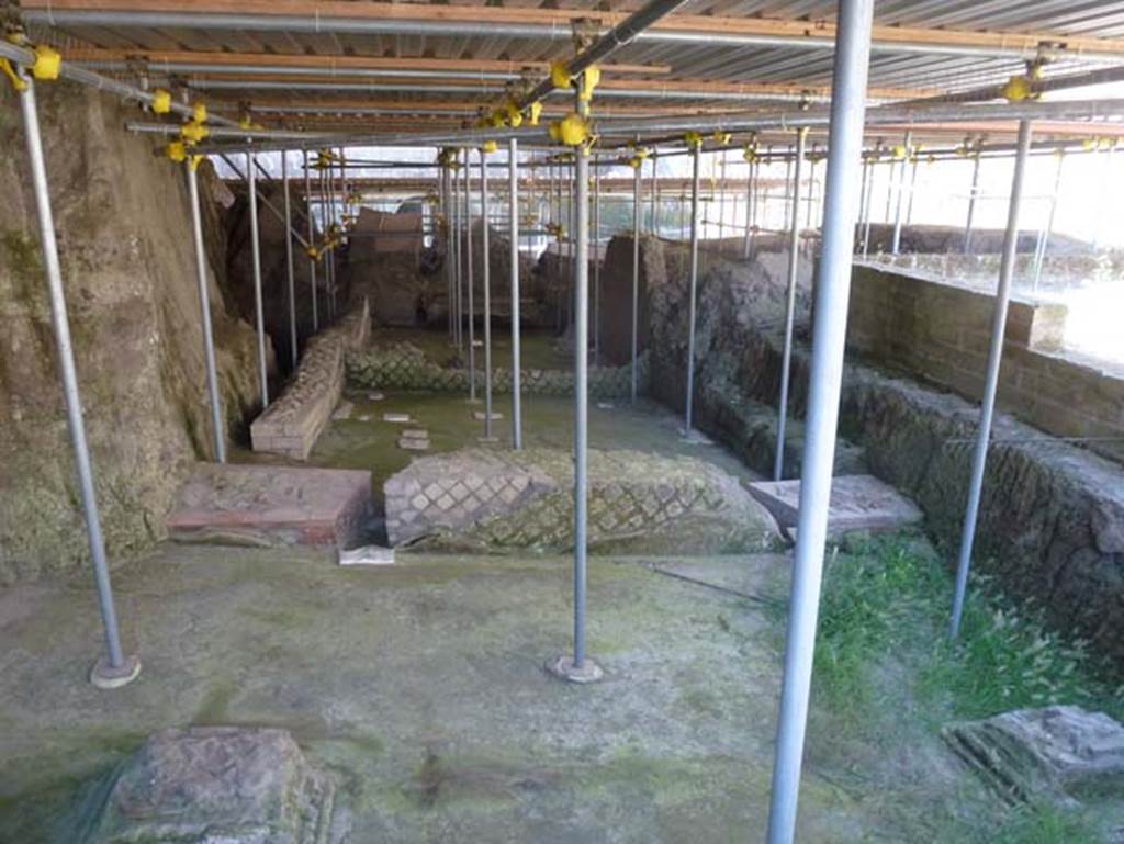 House of Dionysiac Reliefs, Herculaneum, seaside pavilion, June 2012. Looking east from room (e1) across cubiculum diurnum room (c) to room (a) that mirrored it.
Photo courtesy of Michael Binns.